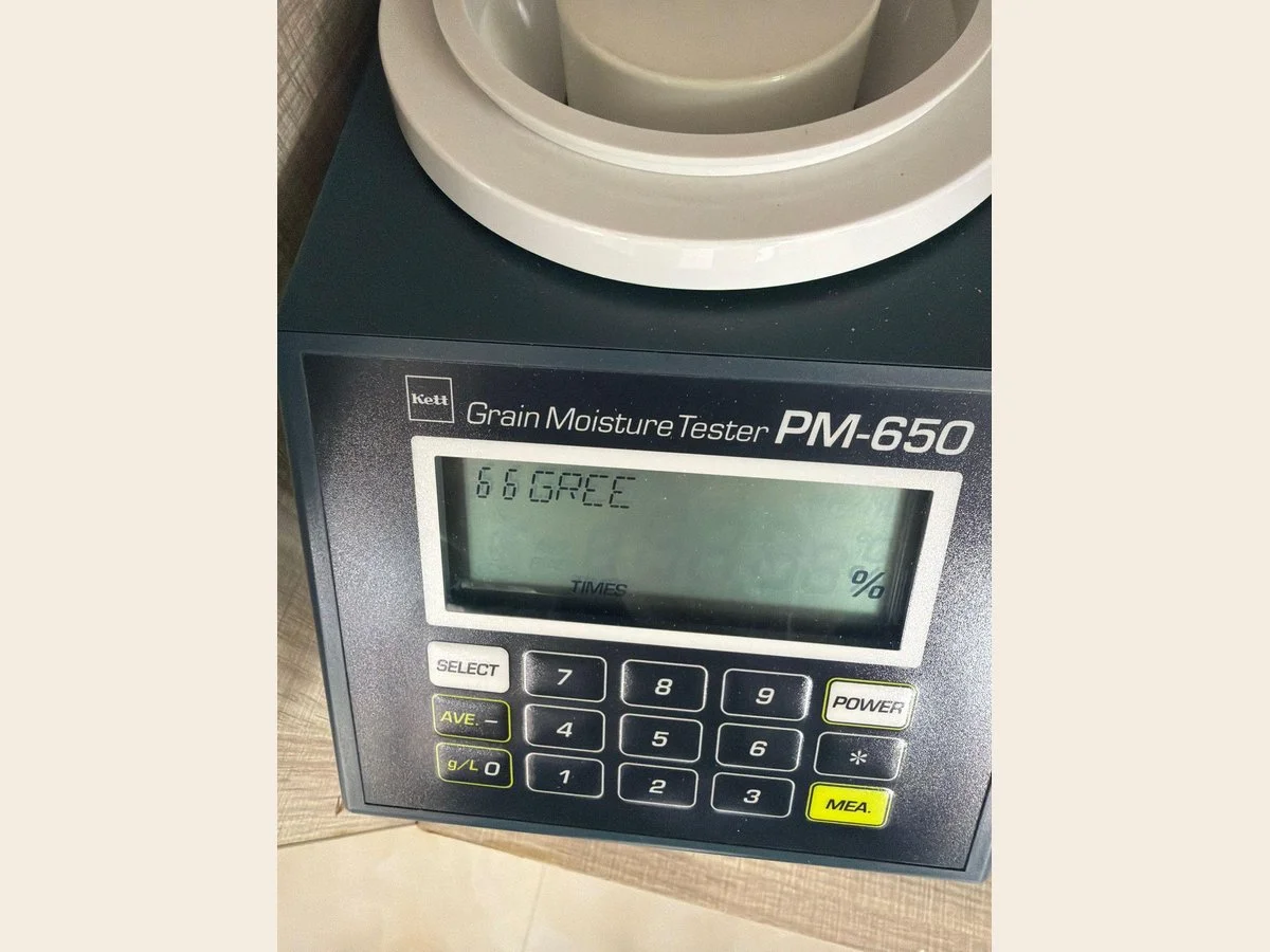 A Kett PM-650 moisture tester used to check every coffee lot
