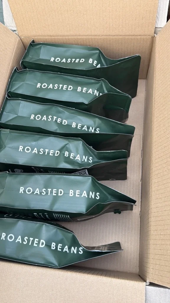 Box of Heleph roasted beans bags packed for shipment