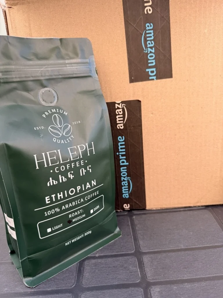 Heleph Ethiopian coffee bag beside a delivery box