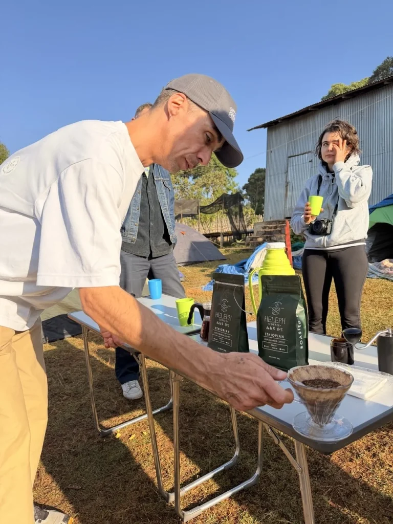 Pour-over coffee brewing at the farm during an origin visit