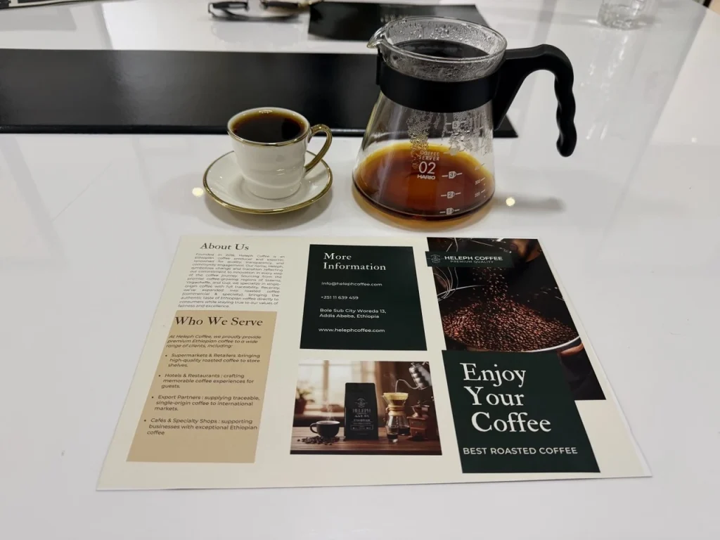 Heleph brochure with pour-over coffee and cup